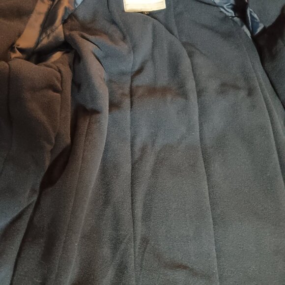 The iconic Abercrombie & Kent expedition red winter coat with blue lining. - Picture 8 of 10